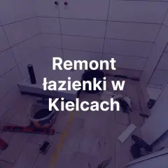 Remont łazienki w trakcie, widoczne płytki, narzędzia i brodzik prysznicowy.